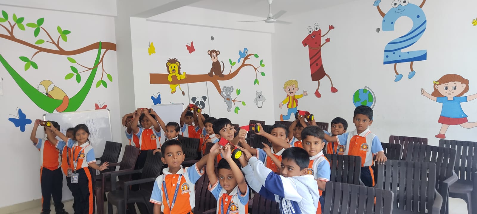Students with their robotics builds at school